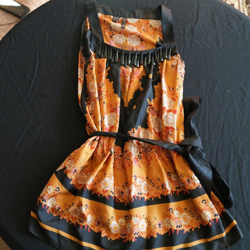 Black gold silk blouse with jewel neck detail